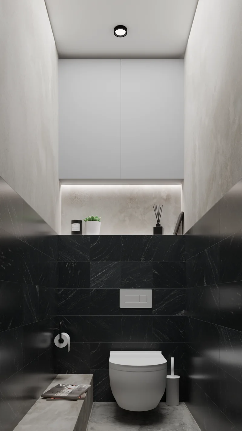 A bathroom with dark marble walls