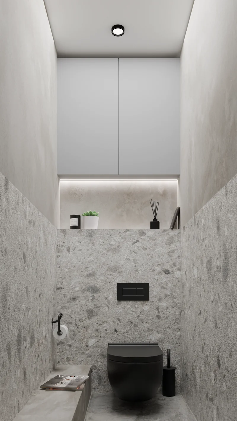 A bathroom with light terrazzo walls